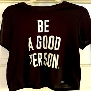 Be a good person cropped black short sleeve t-shirt.